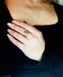 Adjustable triple silver-plated spiral ring. Steel